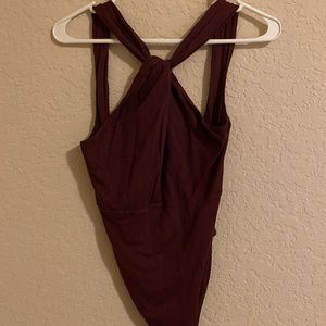 Burgundy bodysuit with fun detail in front